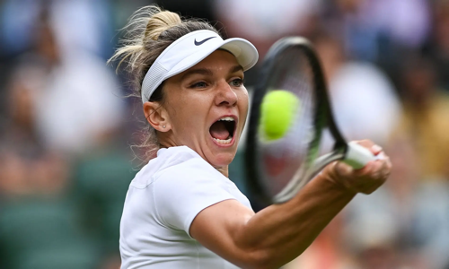 Simona Halep striking a tennis ball with her muscled right arm